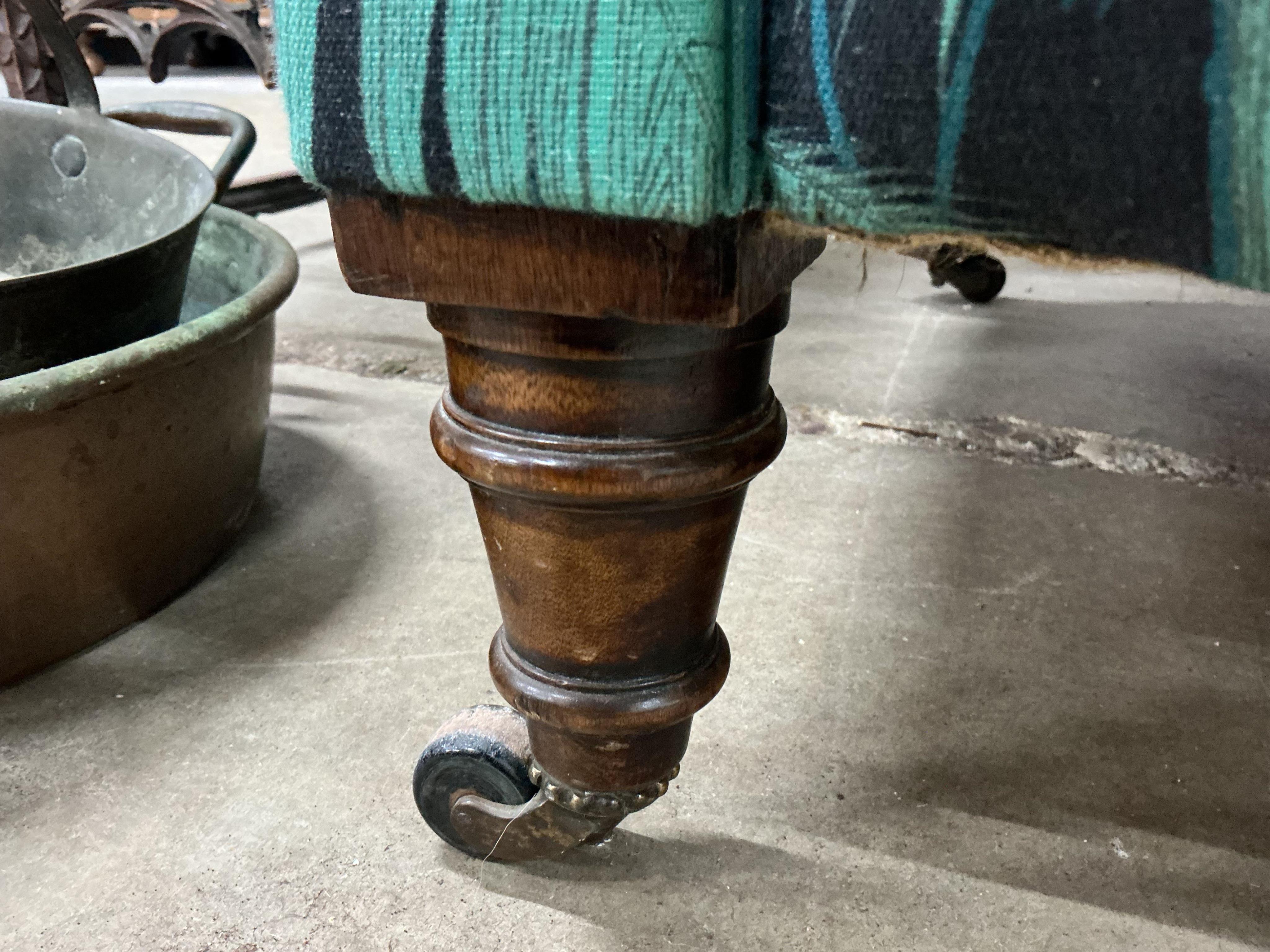 A late Victorian upholstered Chesterfield settee, width 190cm, depth 80cm, height 75cm